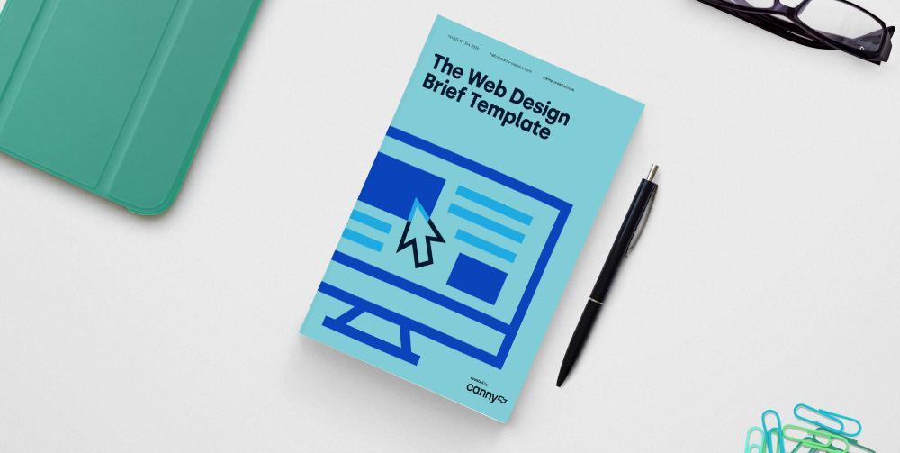 the web design brief template on white desk