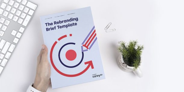 person holding the rebranding brief template