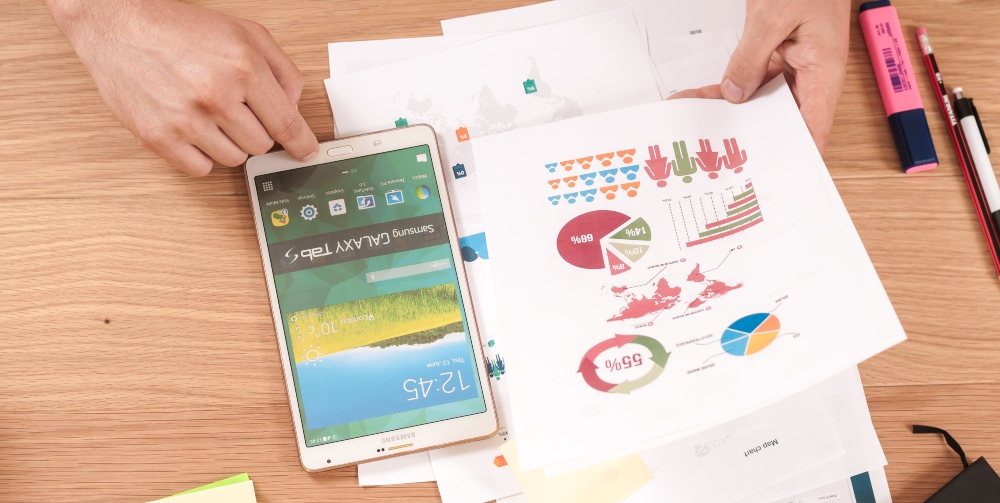 graphs and a mobile on a table