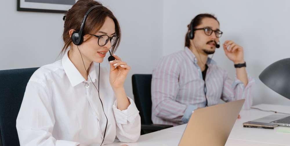 people working with a headset on