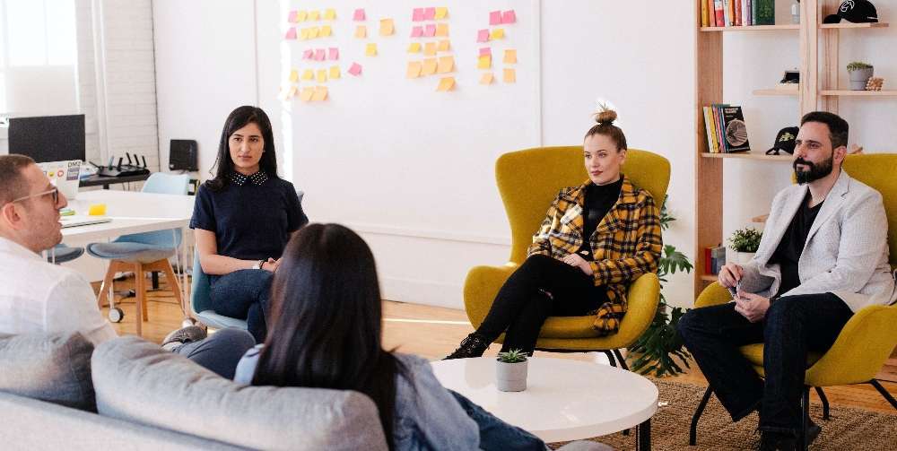 people seated in a meeting