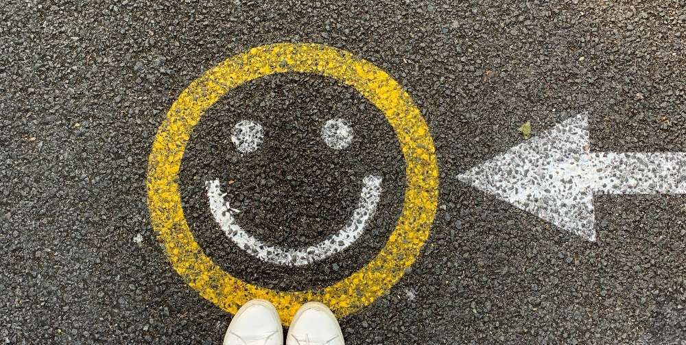 yellow smile face on black ground