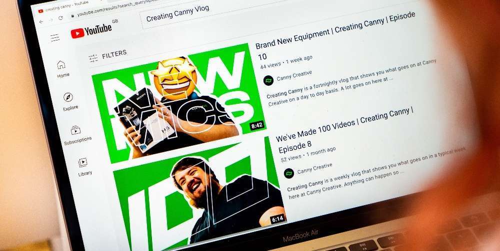 person on YouTube on a laptop