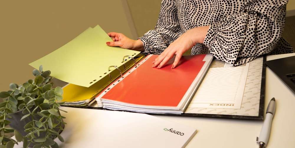 woman looking through file