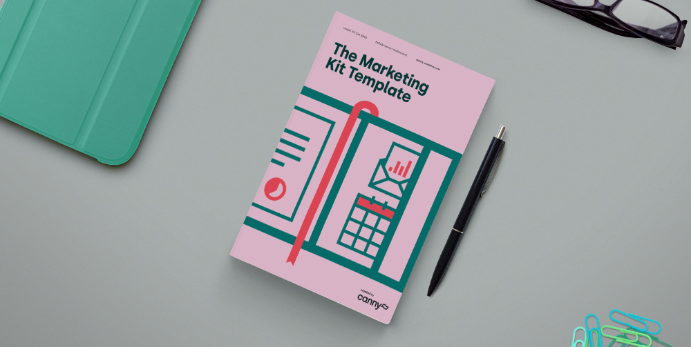 pink marketing kit template on desk