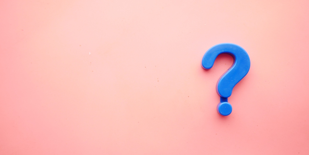 blue question mark on pink background