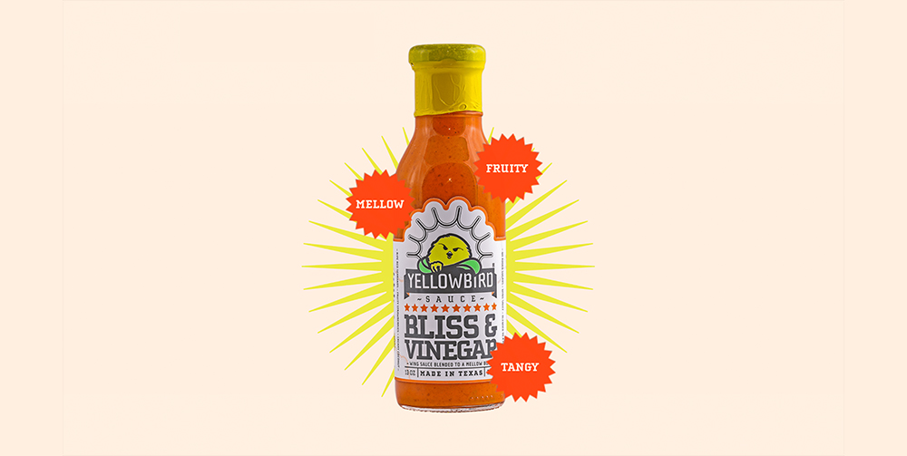 Yellowbird hot sauce on a light background