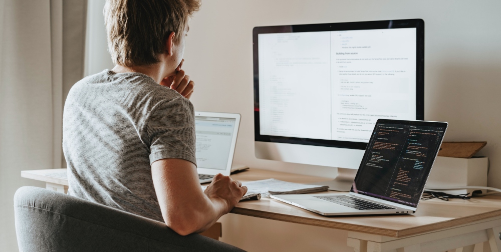 man thinking at desk