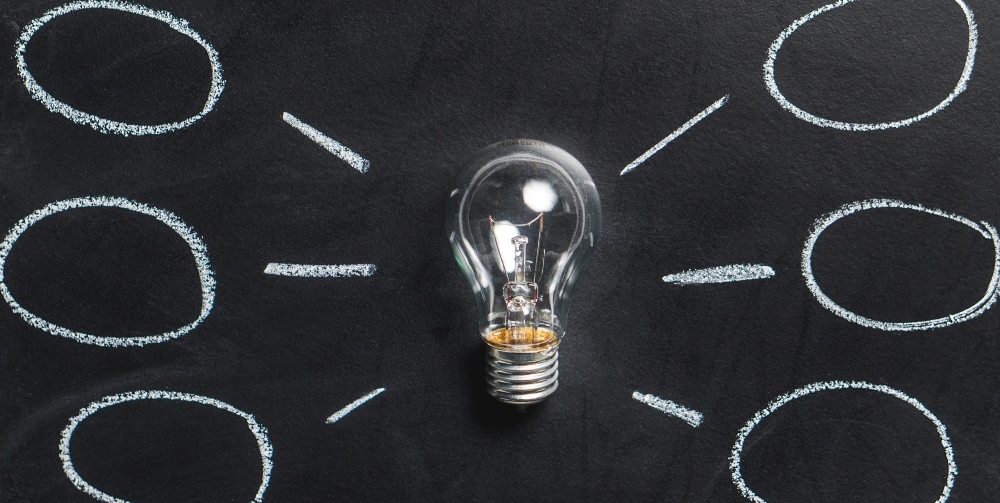 lightbulb with ideas around it