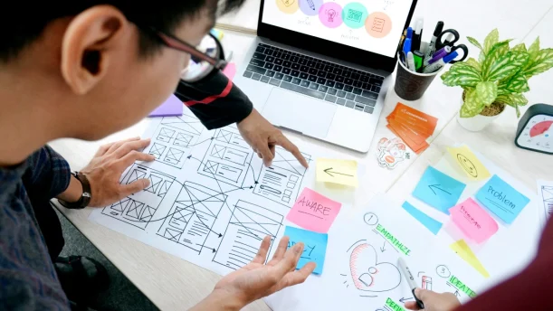 Notes and papers on a desk.