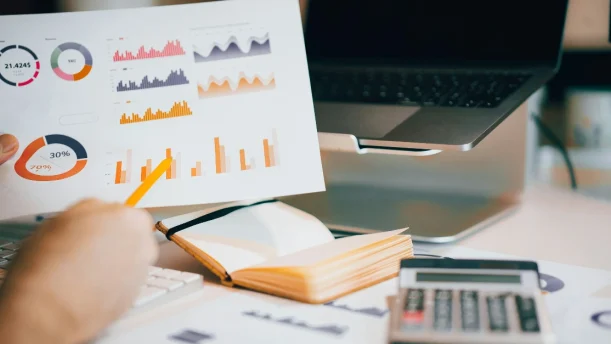 Charts and graphs on a piece of paper.