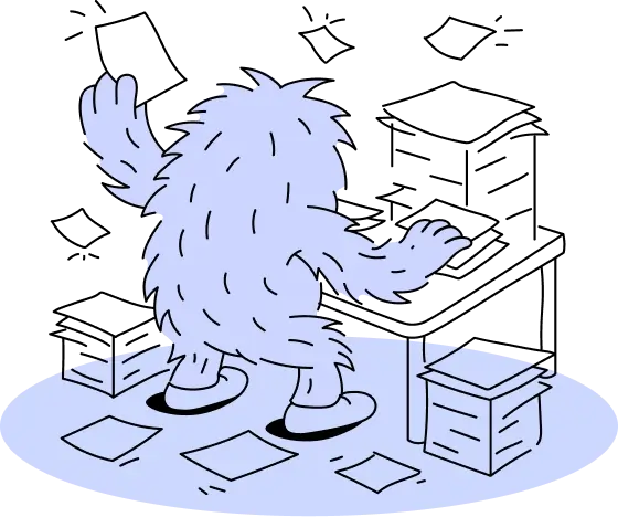 Mark the Marketing Monster with his back to the viewer fighting busywork at his desk